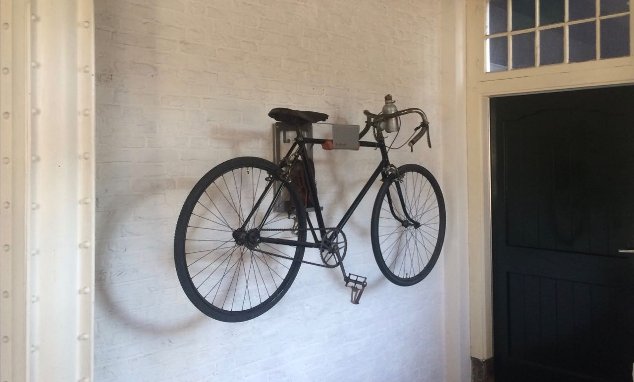 hang bike on wall in apartment