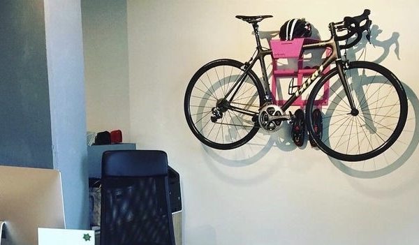 Pink all in one hanging system racing bike